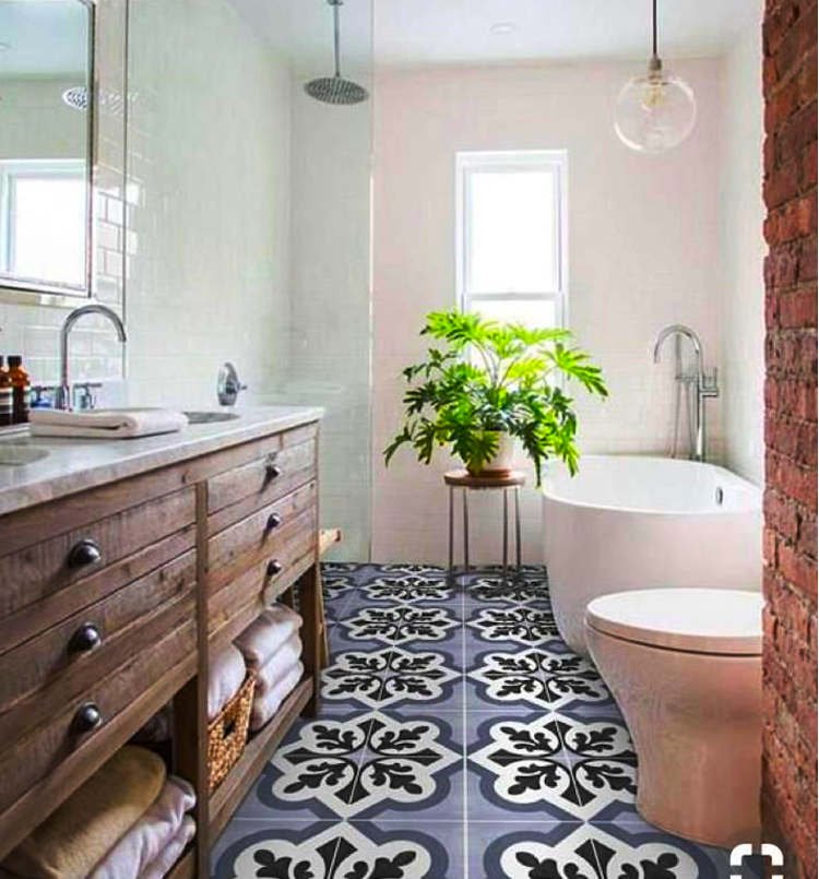 A bathroom with a monochrome tiled floor.